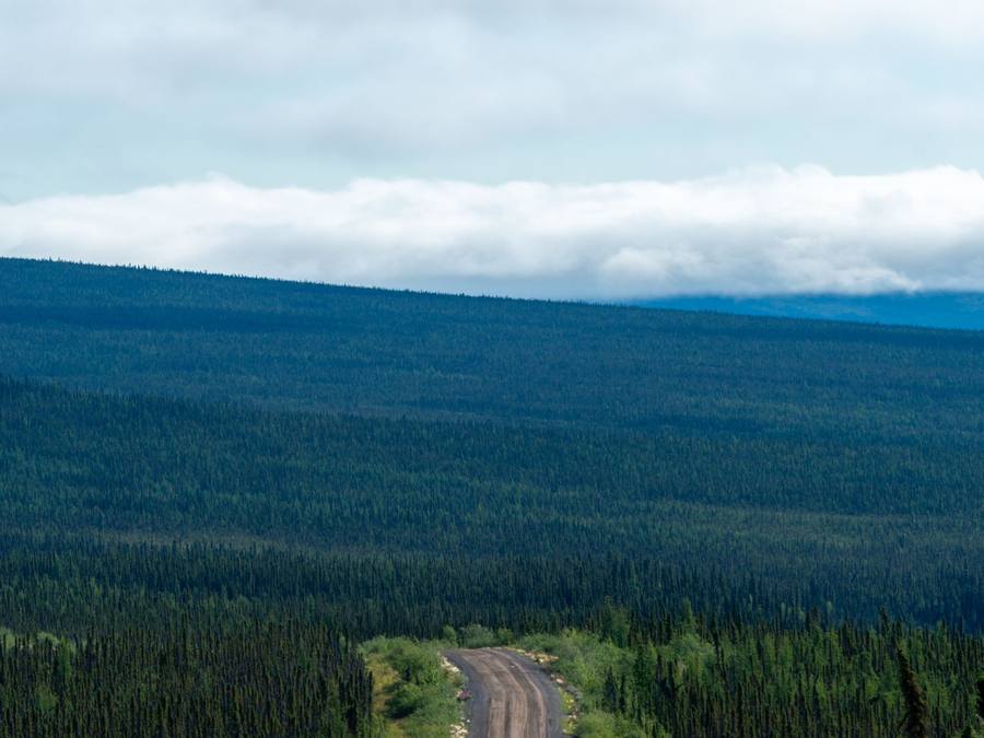 Western Provincial Movers truck on the divided four-lane stretch of Highway 63 north toward Fort McMurray