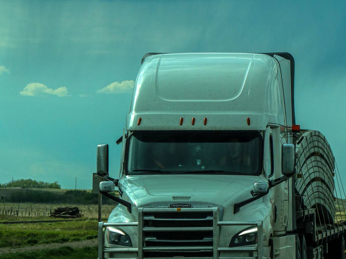 Calgary to Surrey movers loading a Western Provincial Movers truck in Calgary AB