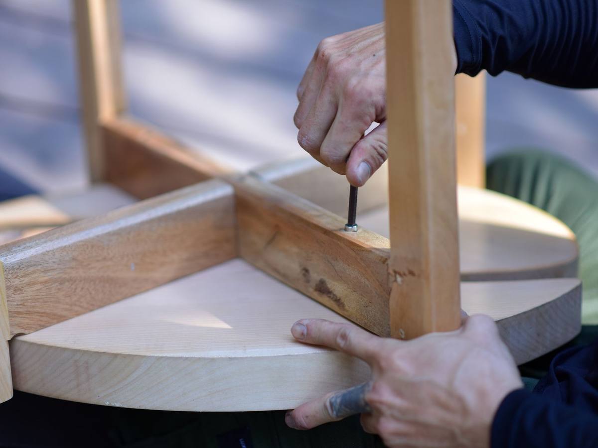 Furniture assembly Calgary crew building a flat-pack wardrobe, Western Provincial Movers, Midnapore Calgary AB