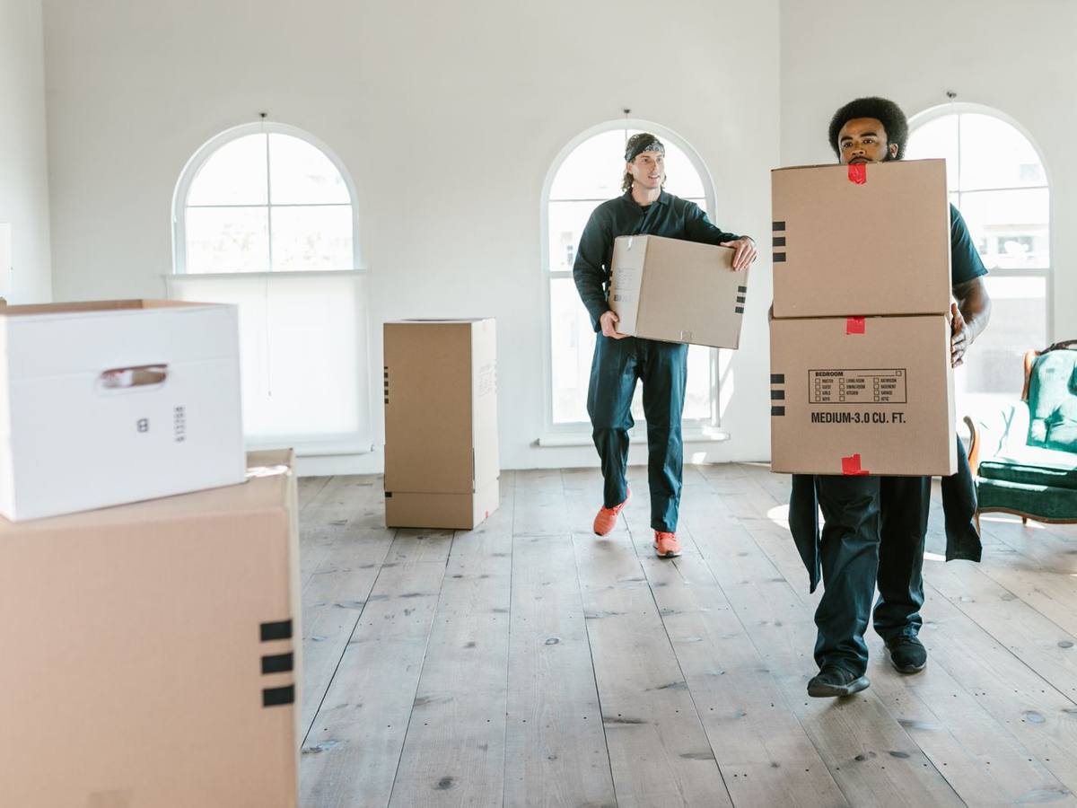 Movers in Evergreen Calgary loading a single-family home near Fish Creek Provincial Park, Western Provincial Movers